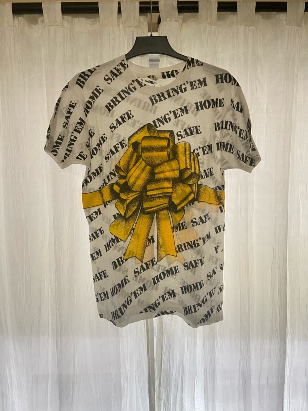 Vintage Screen Stars AOP “Bring’Em Home Safe” White Tee with Yellow Bow Graphic